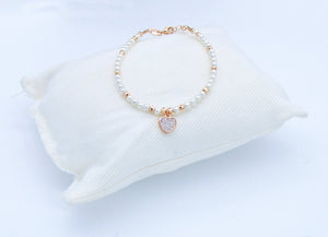Bracciale perline con ciondolo       Ref. S066