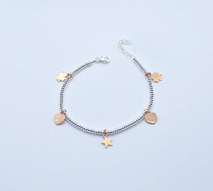 Bracciale Ciambelline con ciondoli misti         Ref. B 4359/CD