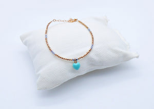 Bracciale ematite ciondolo cuore/stella smaltato         Ref. B 170