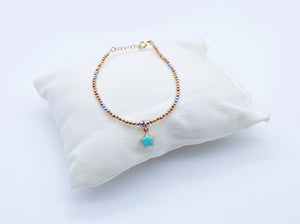 Bracciale ematite ciondolo cuore/stella smaltato         Ref. B 170