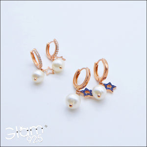Orecchini scatto con con perle e stelle lisce o zirconi blu  Ref. O 119 - O 416