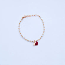 Carica l&#39;immagine nel visualizzatore di Gallery, Bracciale perline e palline rosa con ciondoli smalto e chiave/lucchetto  Ref. B 298
