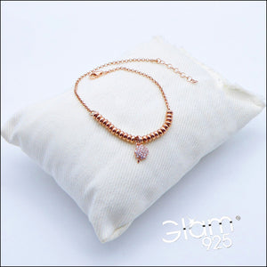 Bracciale rolò con inserti ciambelline rosa e ciondolo Quadrifoglio zirconi  Ref. B 650/HB