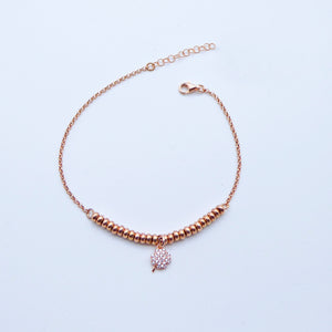 Bracciale rolò con inserti ciambelline rosa e ciondolo Quadrifoglio zirconi  Ref. B 650/HB