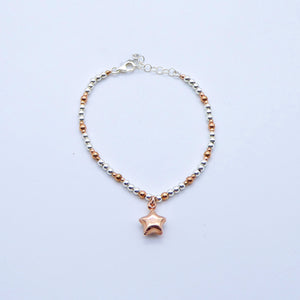 Bracciale palline in argento bicolore con Cuore/Stella bombati   Ref. B 422