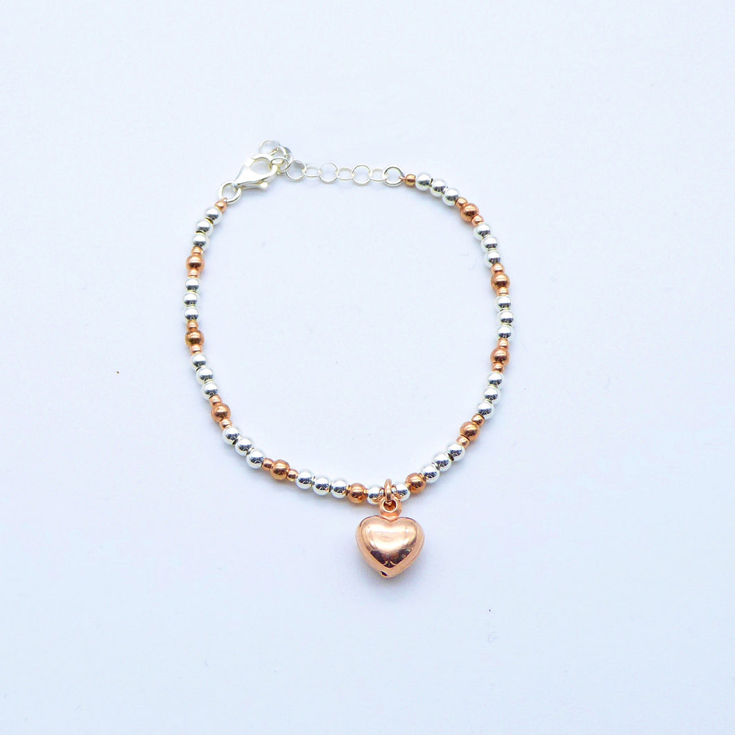 Bracciale palline in argento bicolore con Cuore/Stella bombati   Ref. B 422